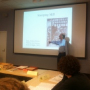 John Bidwell lecturing in class.